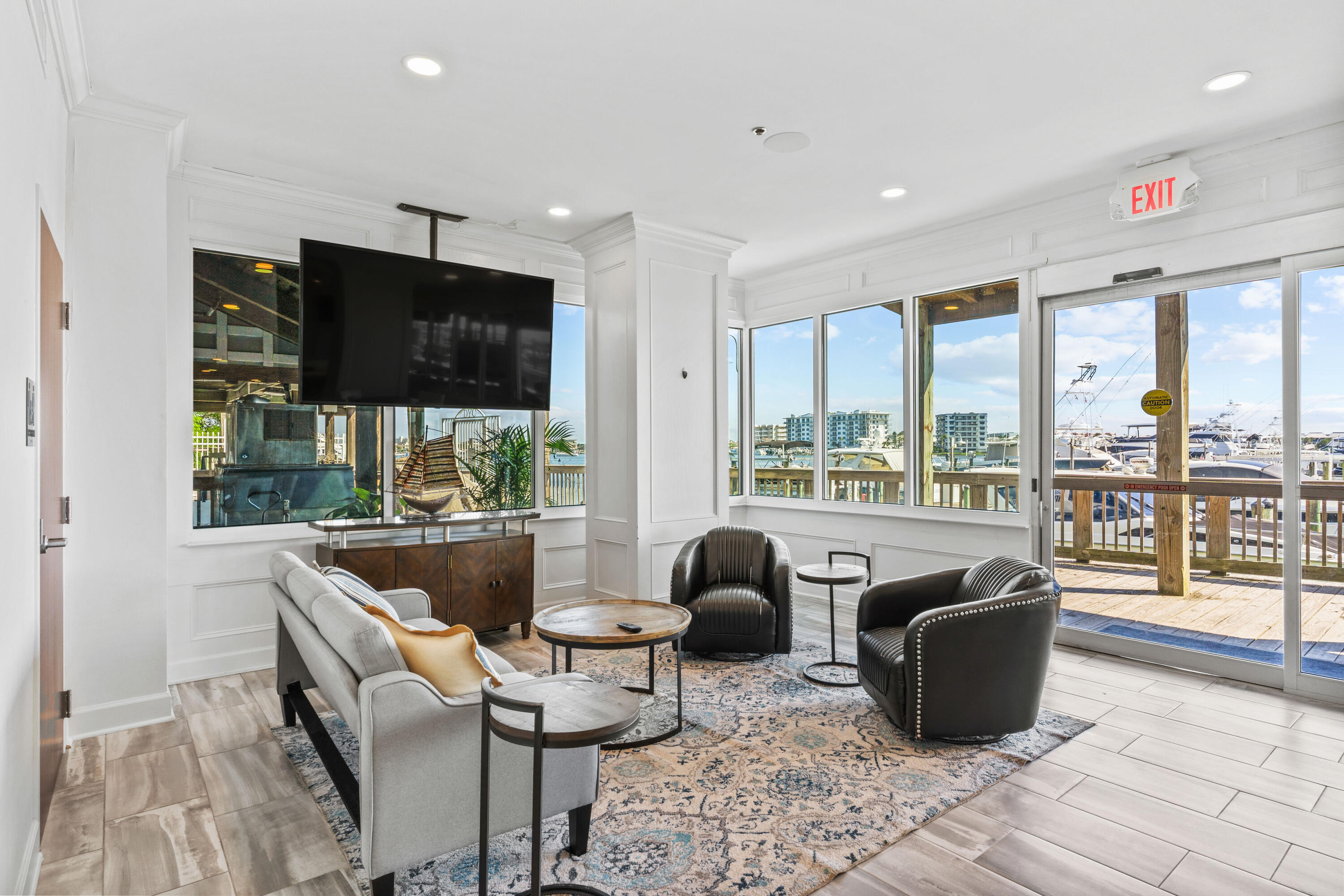 320 Harbor Boulevard, Unit 1201 Destin, FL 32541 - Photo 65 of 86 a living room with fireplace furniture and a flat screen tv