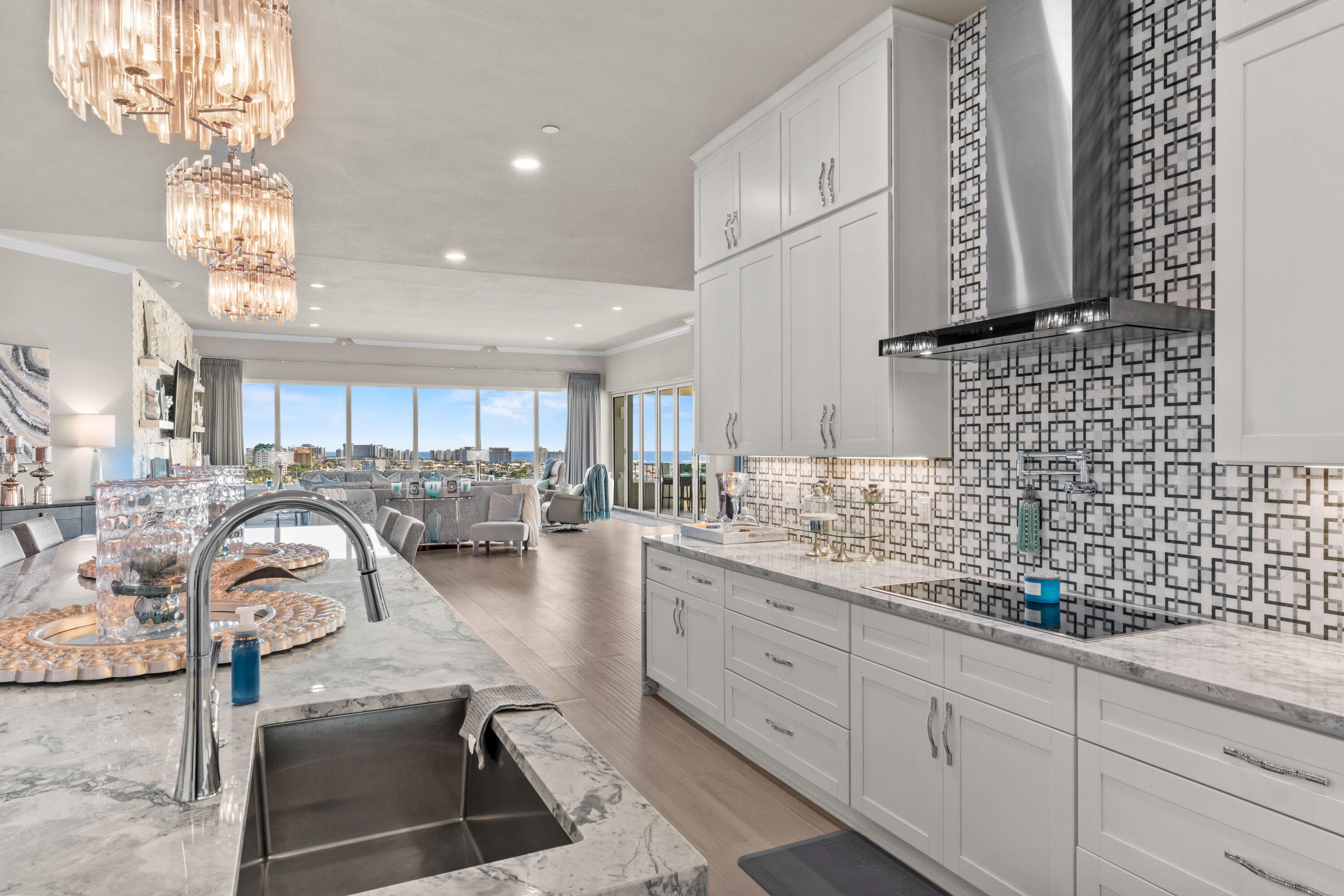 320 Harbor Boulevard, Unit 1201 Destin, FL 32541 - Photo 7 of 86 a kitchen with stainless steel appliances granite countertop a sink a stove and cabinets