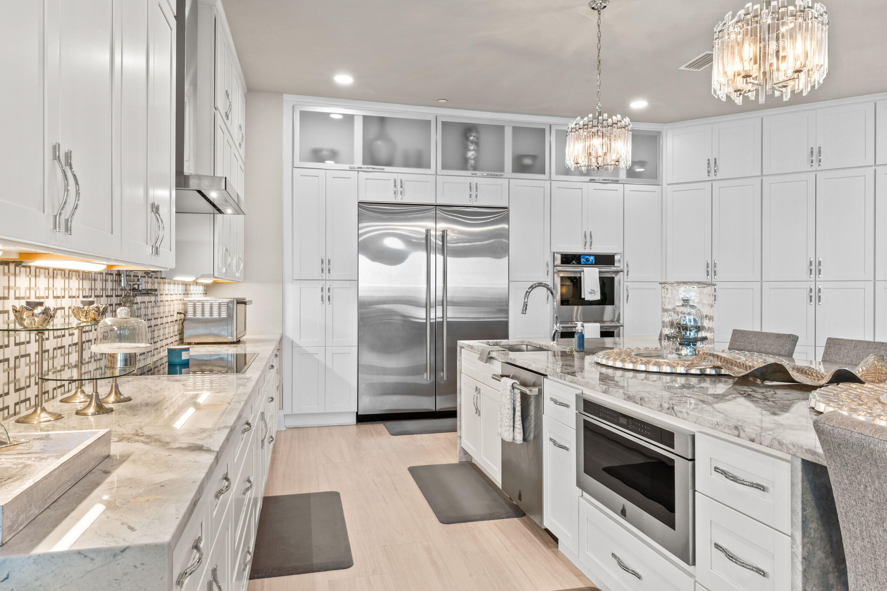 320 Harbor Boulevard, Unit 1201 Destin, FL 32541 - Photo 8 of 86 a kitchen with stainless steel appliances granite countertop a stove a sink and a refrigerator