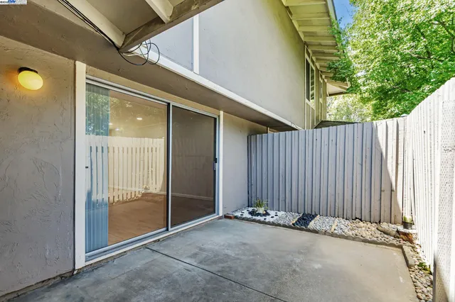 a back view of a house with a sink