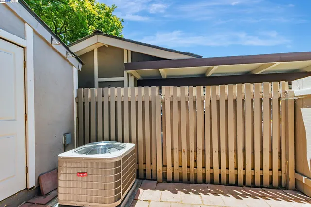 a view of a cars parked in front of a building