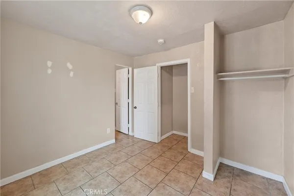 a bathroom with a sink a toilet a shower and a mirror
