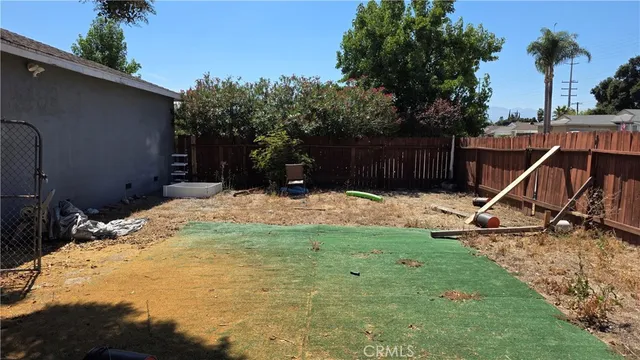 a view of a backyard with a slide