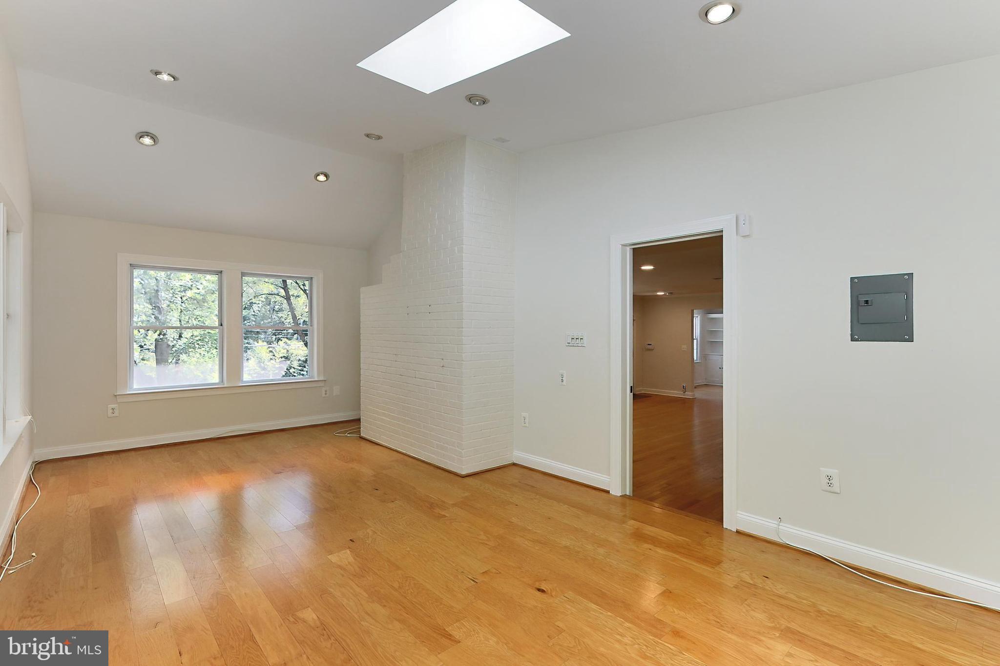 3304 Annandale Road Falls Church, VA 22042 - Photo 22 of 57 Main Level Bedroom w/Exposed Brick Wall