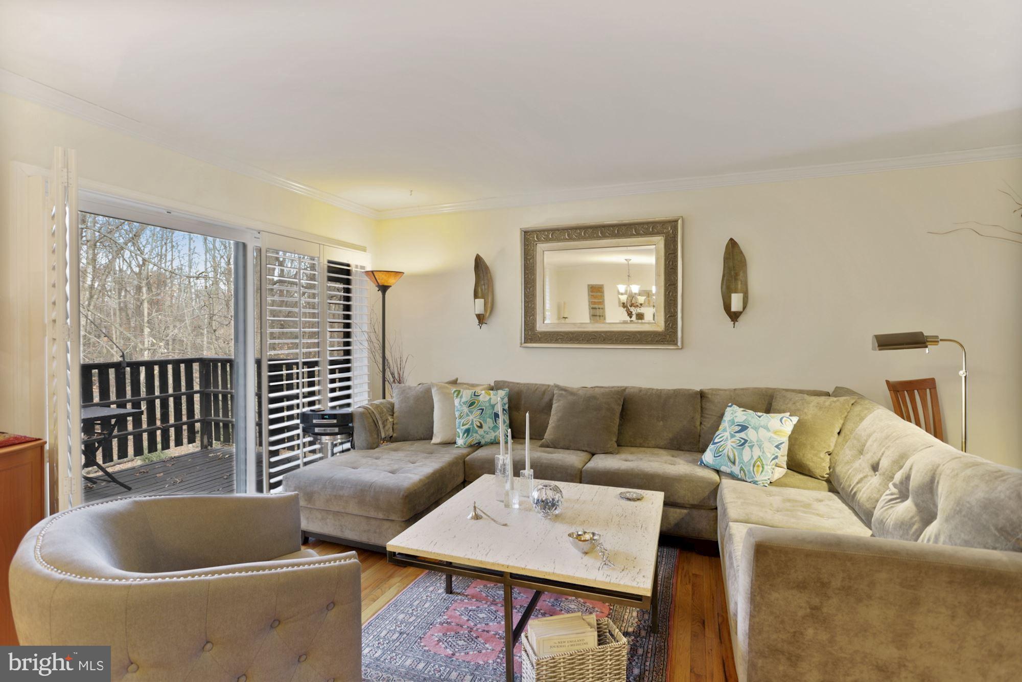 8017 Inverness Ridge Road Potomac, MD 20854 - Photo 2 of 19 Living Room with sliding door to deck