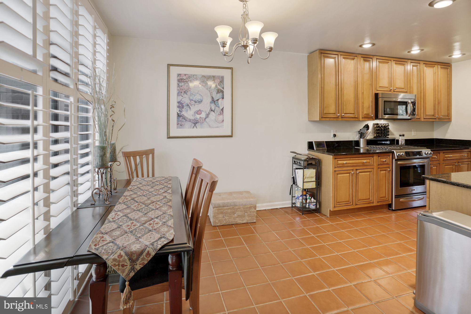 8017 Inverness Ridge Road Potomac, MD 20854 - Photo 7 of 19 Kitchen table with window