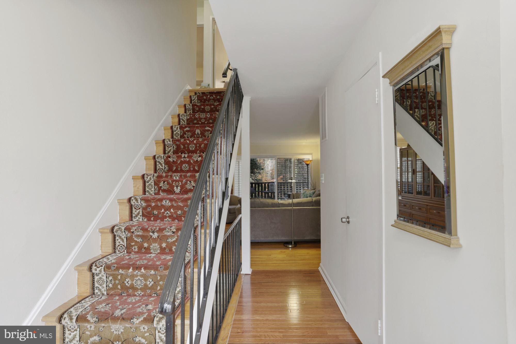 8017 Inverness Ridge Road Potomac, MD 20854 - Photo 9 of 19 Stairs to upper level