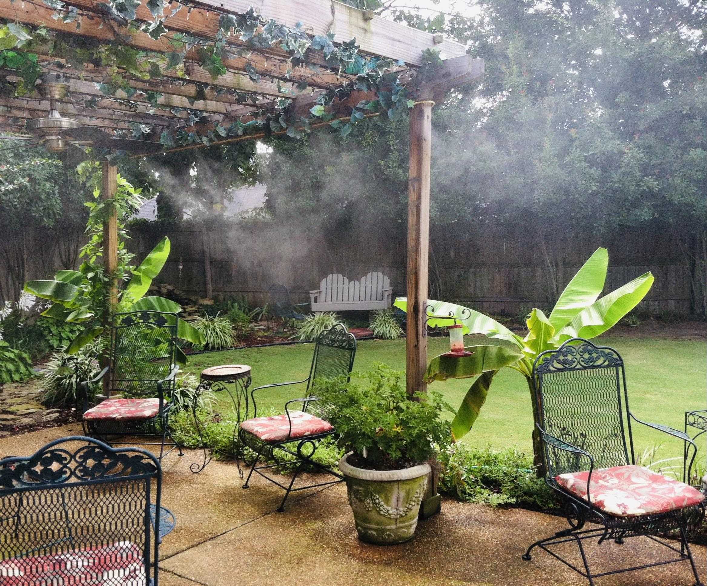 256 Windy Ridge Cove Collierville, TN 38017 - Photo 24 of 25 a view of a chair and table in backyard with plants