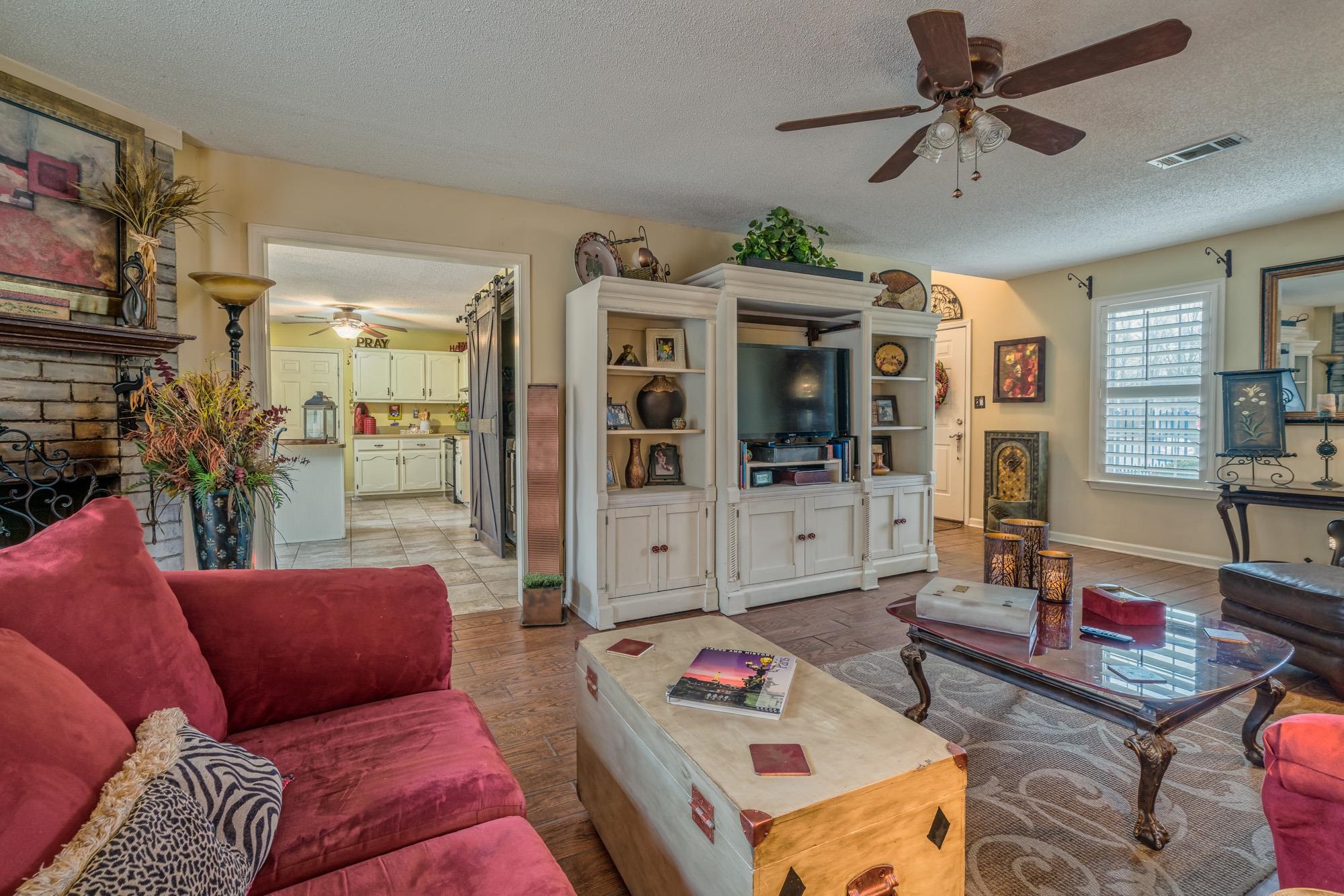 256 Windy Ridge Cove Collierville, TN 38017 - Photo 7 of 25 a living room with furniture and flat screen tv