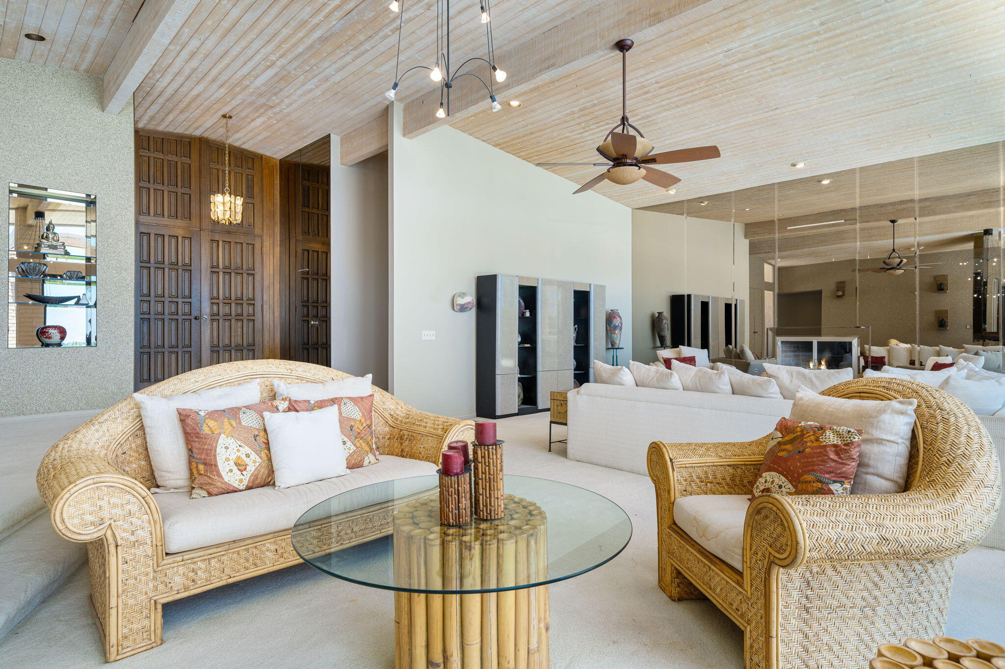 70465 Pecos Road Rancho Mirage, CA 92270 - Photo 12 of 48 a living room with furniture a chandelier and a chandelier