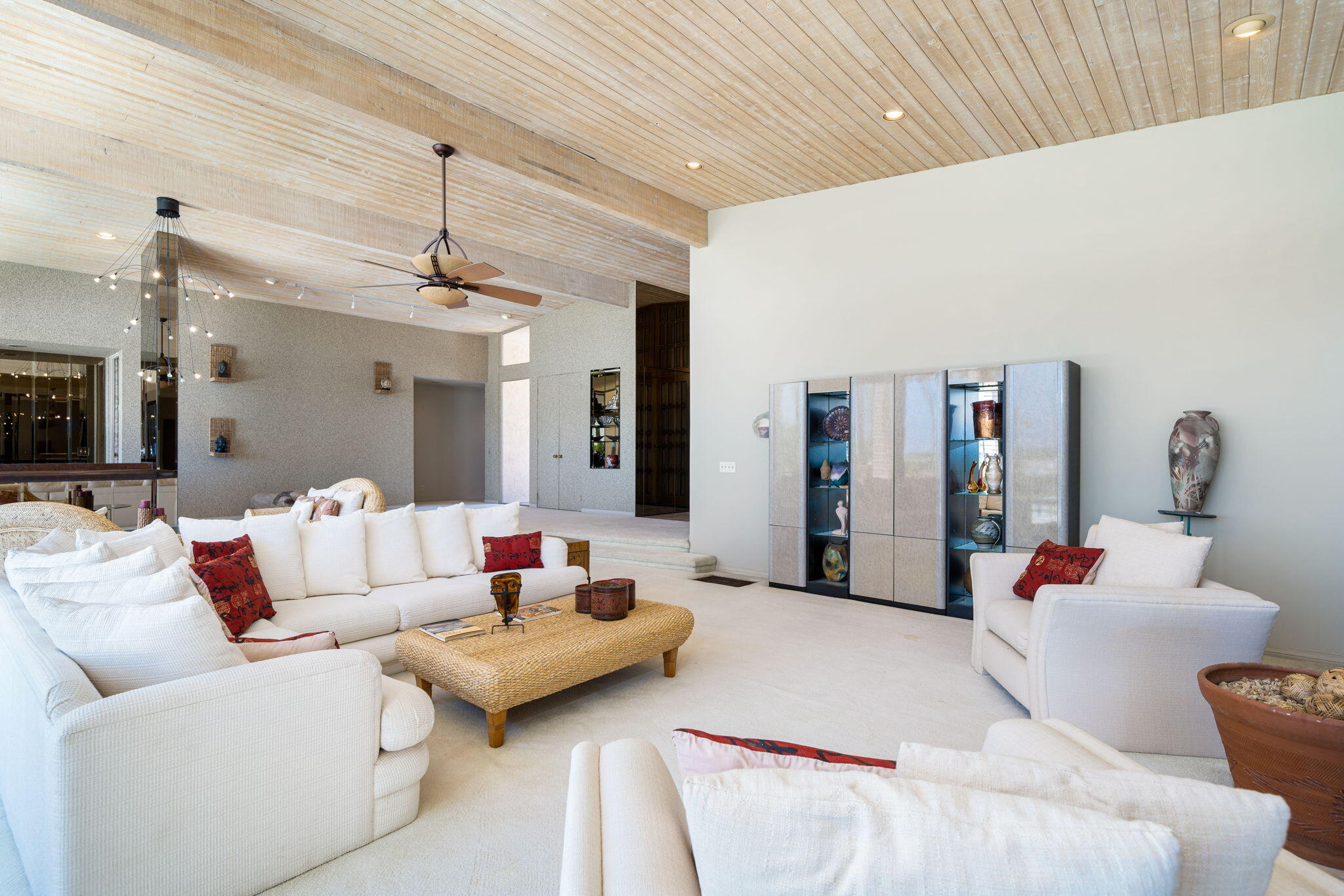 70465 Pecos Road Rancho Mirage, CA 92270 - Photo 16 of 48 a living room with furniture and a chandelier