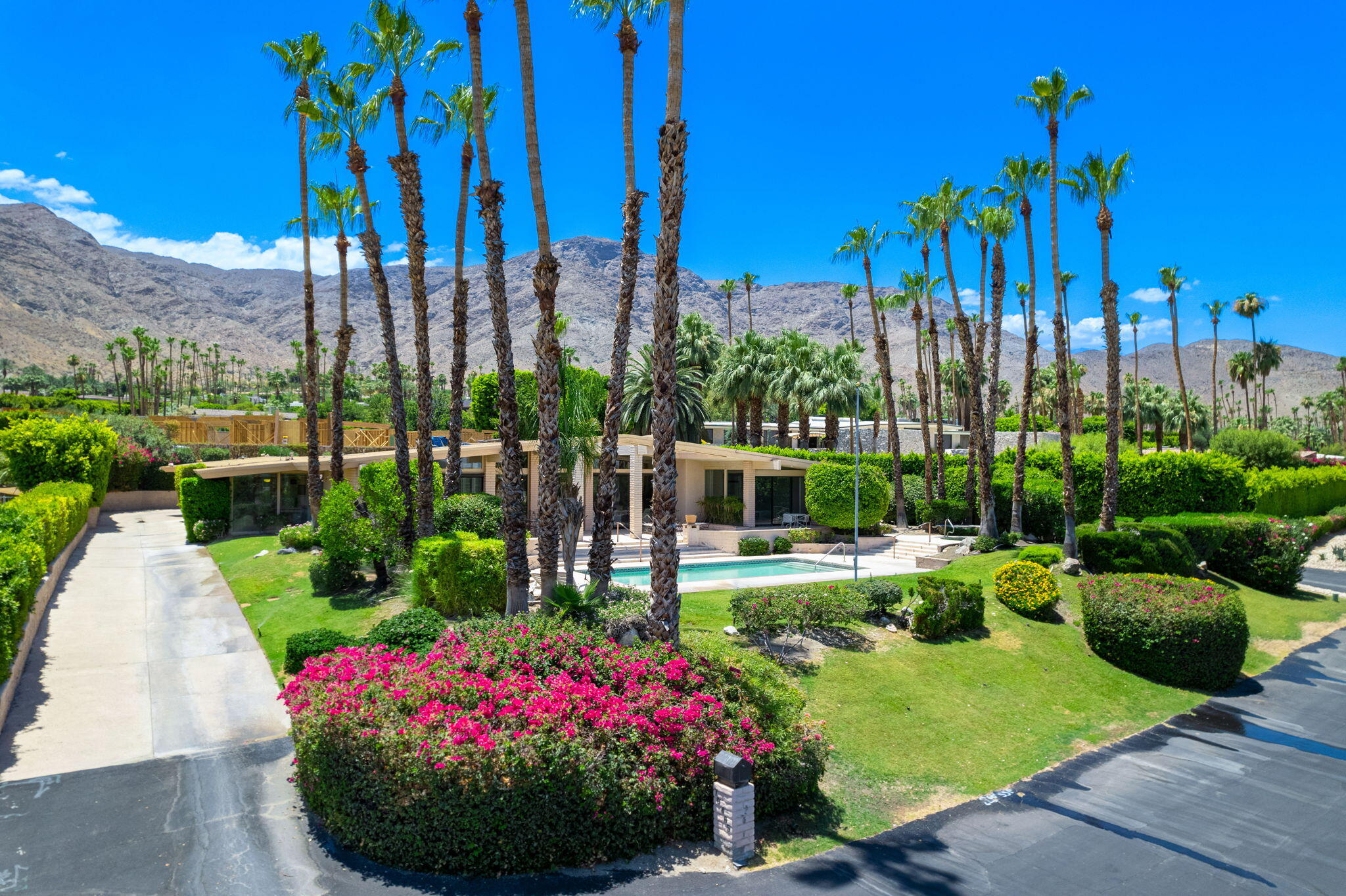 70465 Pecos Road Rancho Mirage, CA 92270 - Photo 3 of 48 a view of a garden with potted plants