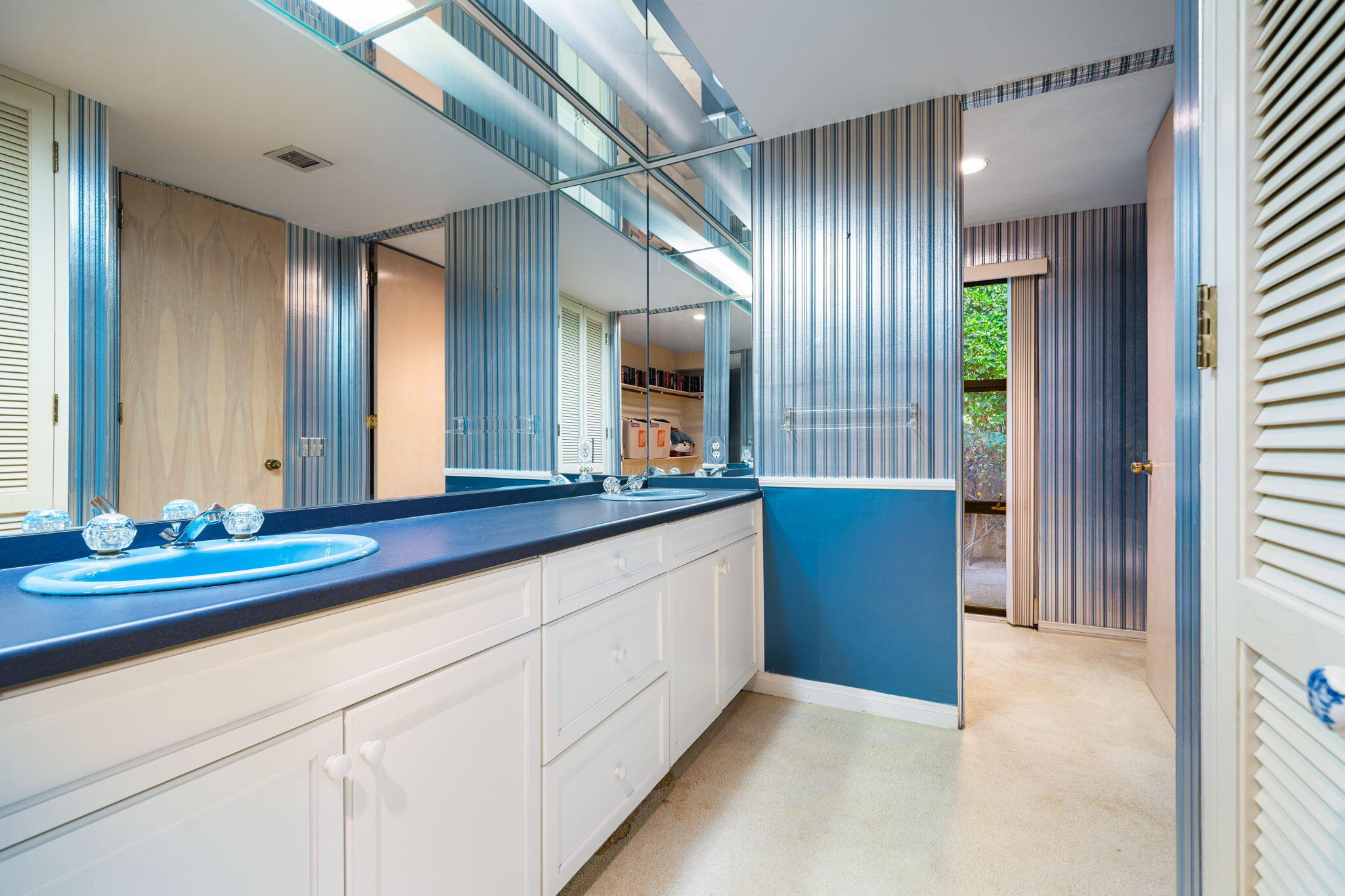 70465 Pecos Road Rancho Mirage, CA 92270 - Photo 43 of 48 a bathroom with a sink and a mirror