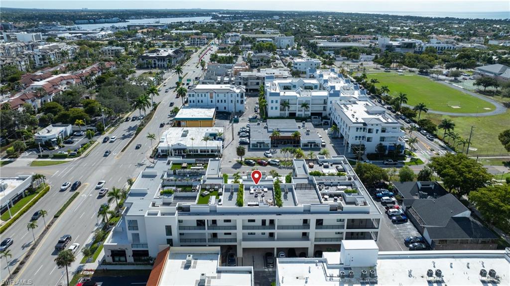 82 9th Street South, Unit 303 Naples, FL 34102 - Photo 23 of 26 an aerial view of city