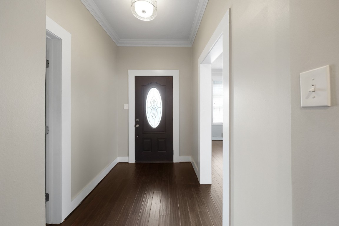 309 Pecore Street Houston, TX 77009 - Photo 16 of 45 a view of a hallway with wooden floor