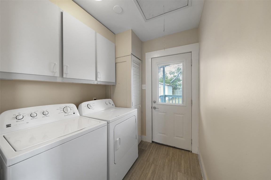 309 Pecore Street Houston, TX 77009 - Photo 28 of 45 a view of storage and utility room with washer and dryer