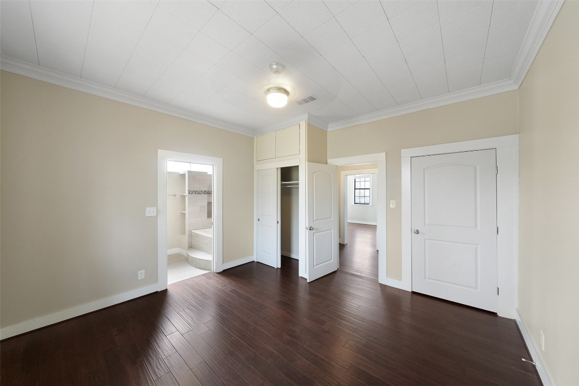 309 Pecore Street Houston, TX 77009 - Photo 10 of 45 wooden floor in an empty room with a window