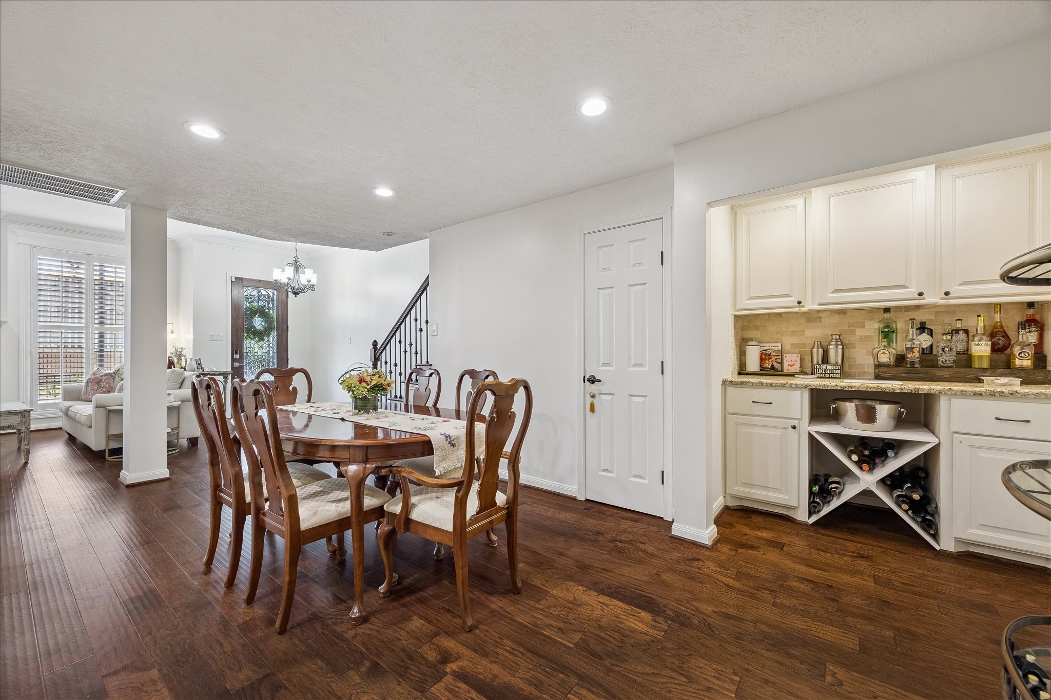 4520 Dickson Street Houston, TX 77007 - Photo 11 of 25 Dry bar with cabinet storage and space for a wine fridge. Large closet under the stairs.