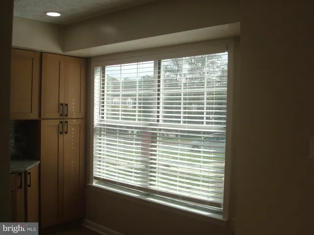 a view of a room that has a window in it