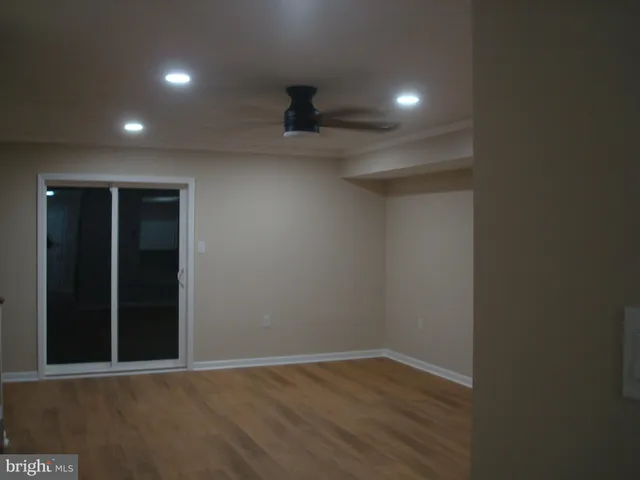 a view of kitchen and hallway