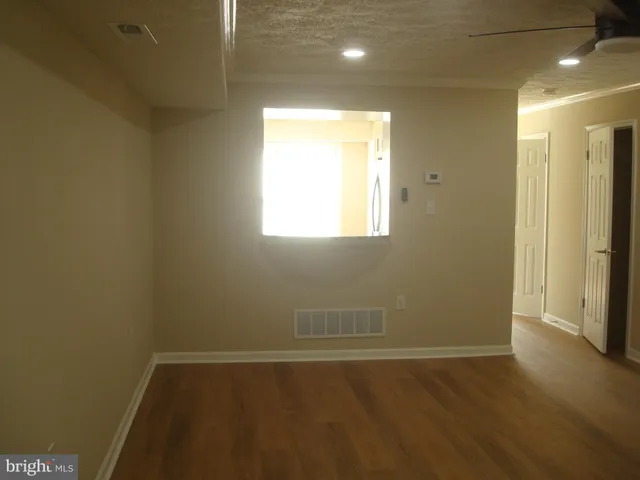 a view of a window in an empty room