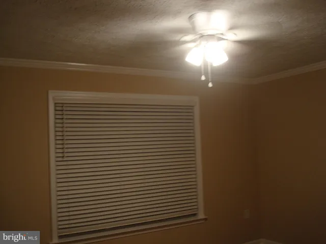 a view of a room that has a window