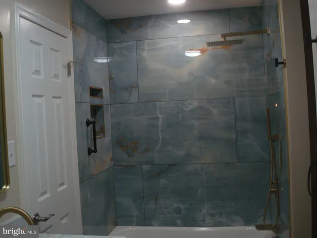 a bathroom with a toilet and a sink