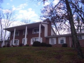 141 Wonder Valley Road Bristol, TN 37620 - Photo 1 of 18 Rocking chair front porch