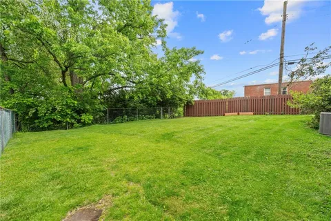 a view of a backyard with a garden