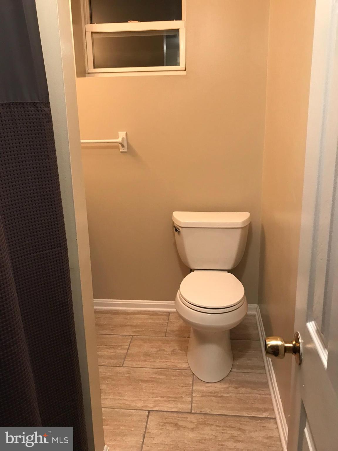 1458 Riverside Avenue, Unit 2B Baltimore, MD 21230 - Photo 11 of 16 a bathroom with a toilet