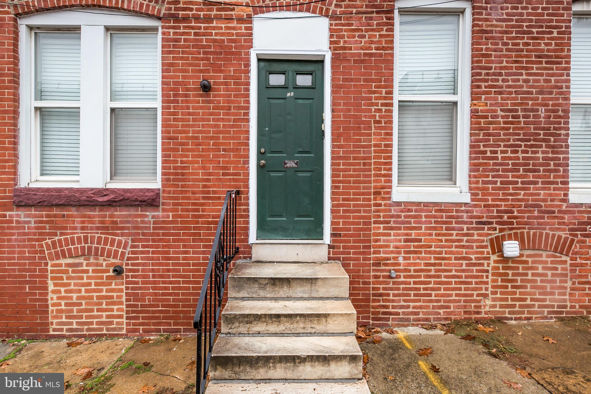 1458 Riverside Avenue, Unit 2B Baltimore, MD 21230 - Photo 2 of 16 a view of a brick house with a large window