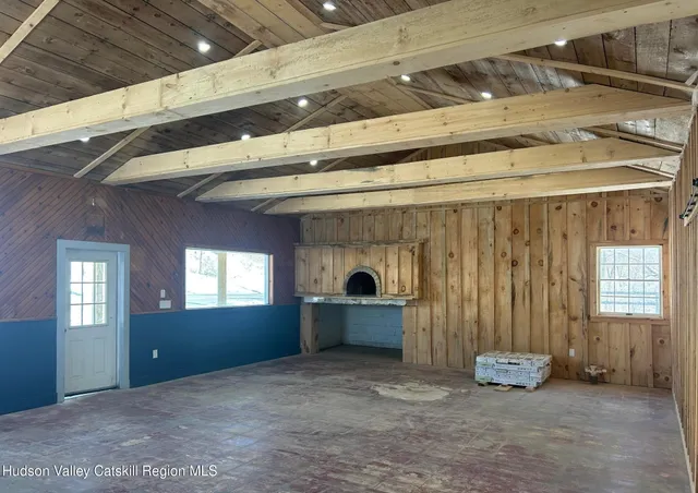 a view of an empty room and window