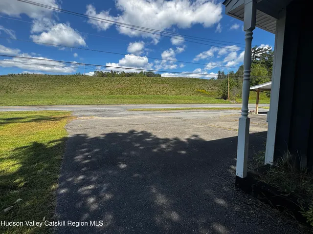 a view of an ocean and a yard