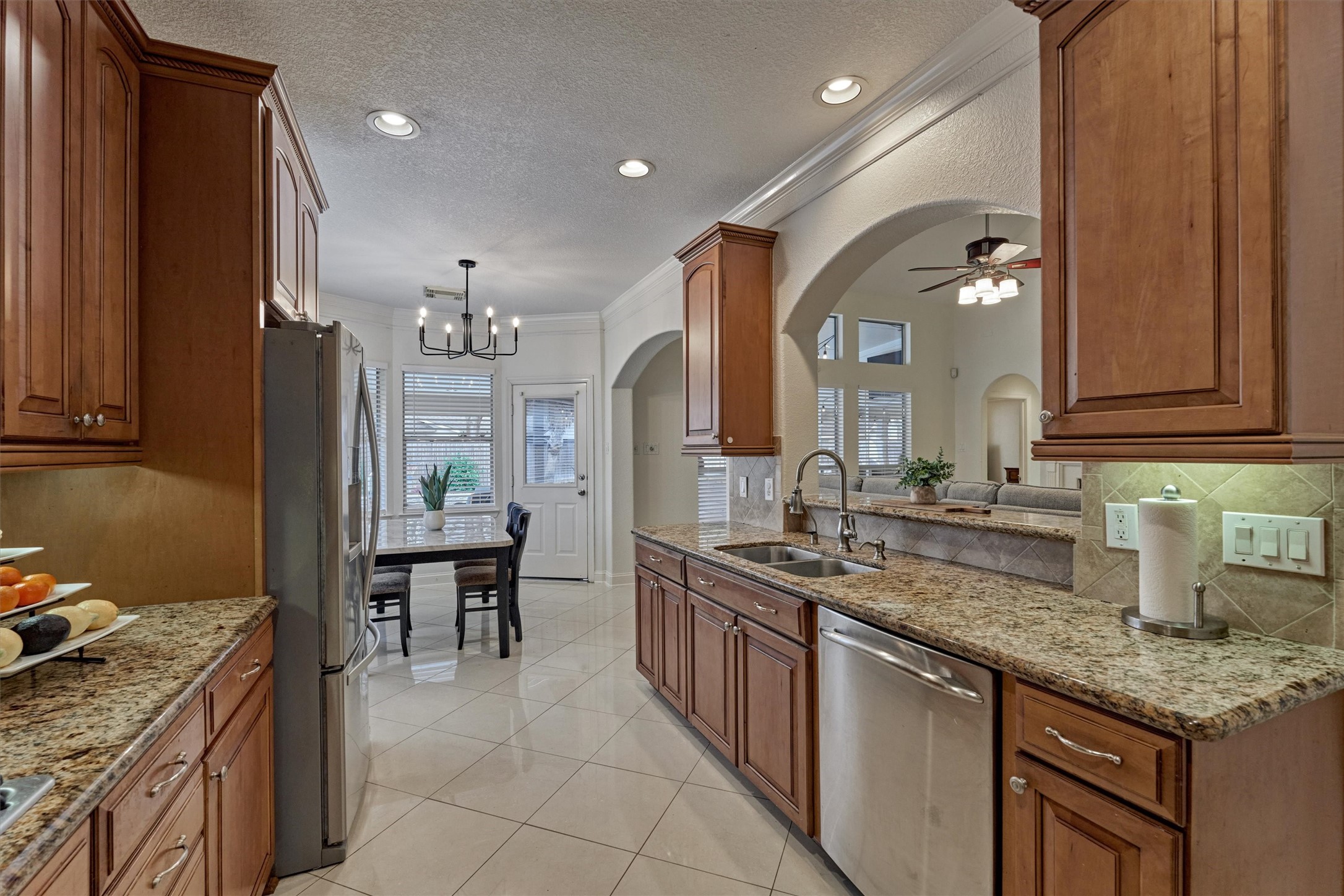 20938 Thistleberry Lane Spring, TX 77379 - Photo 16 of 45 Breakfast room is connected to kitchen and living room.