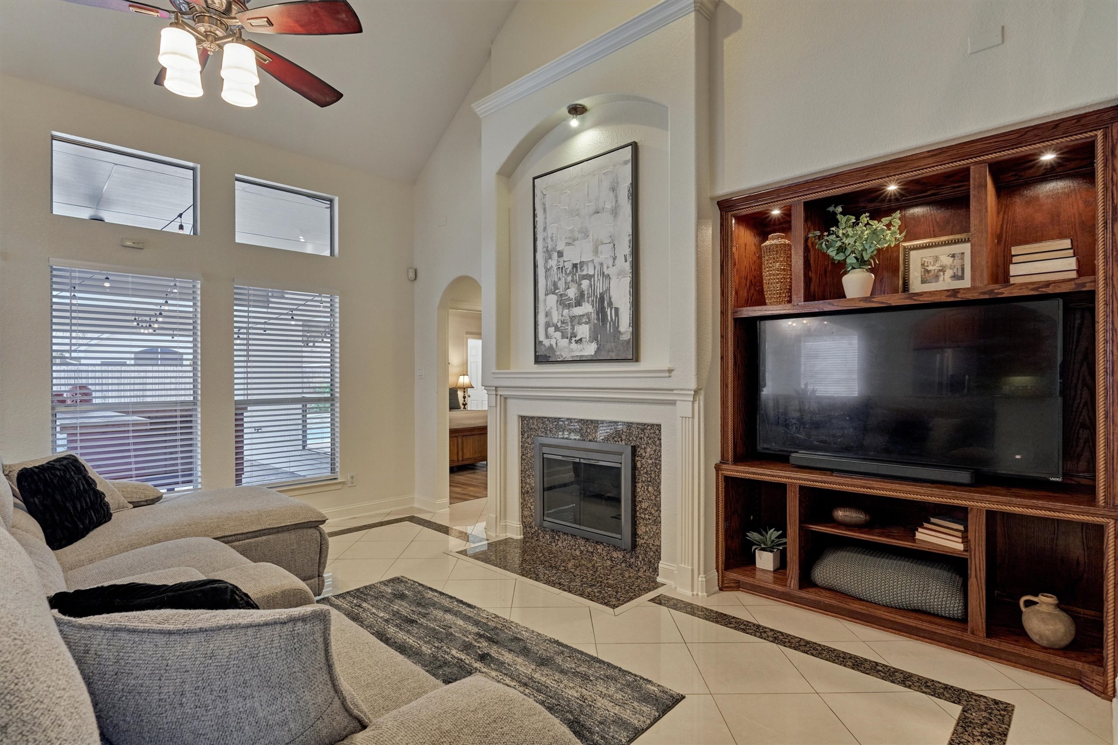 20938 Thistleberry Lane Spring, TX 77379 - Photo 20 of 45 Living room with wall of windows looking out to backyard paradise.