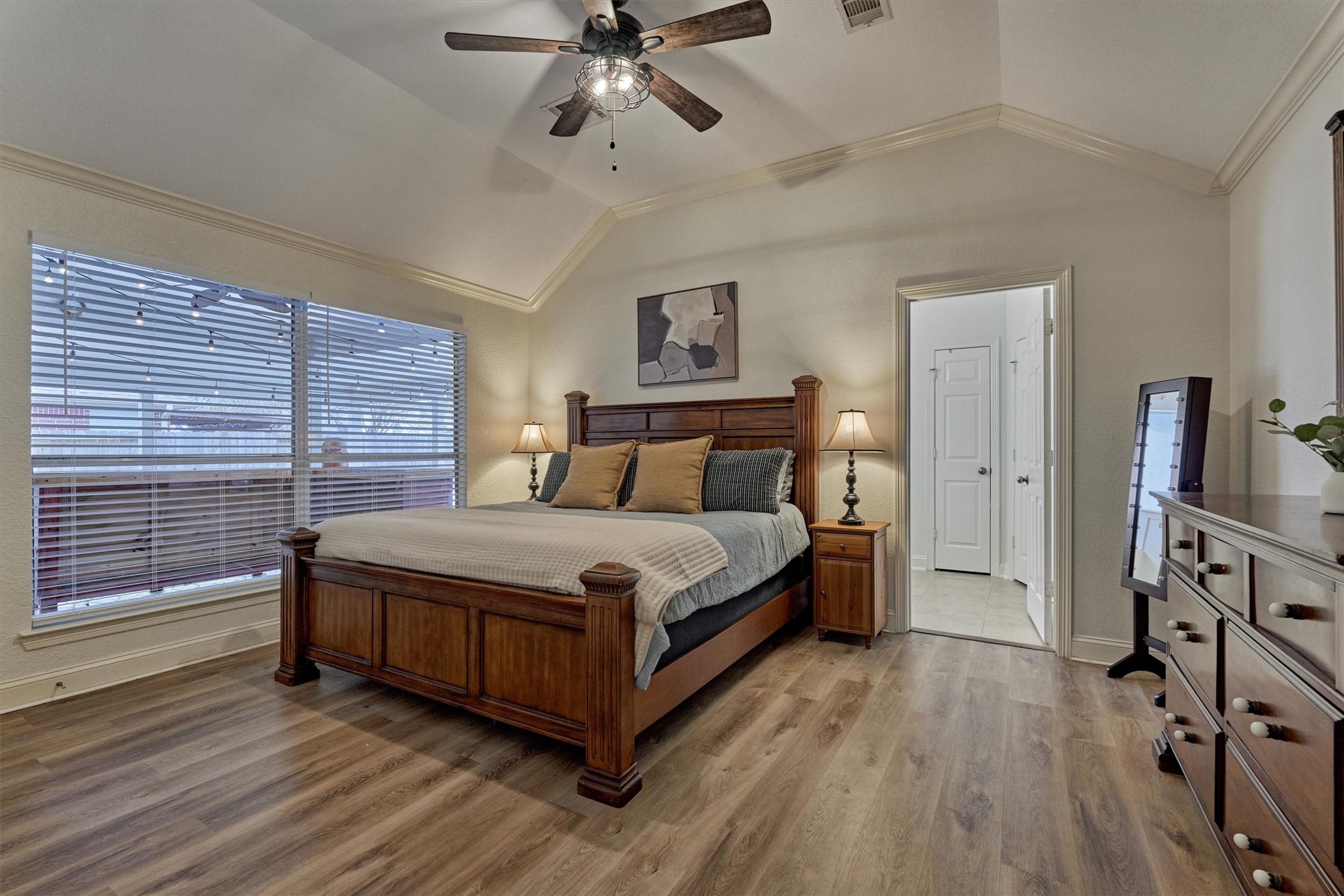 20938 Thistleberry Lane Spring, TX 77379 - Photo 23 of 45 Primary bedroom with ensuite bath and walk-in closet creates the perfect space for relaxation and refreshment.