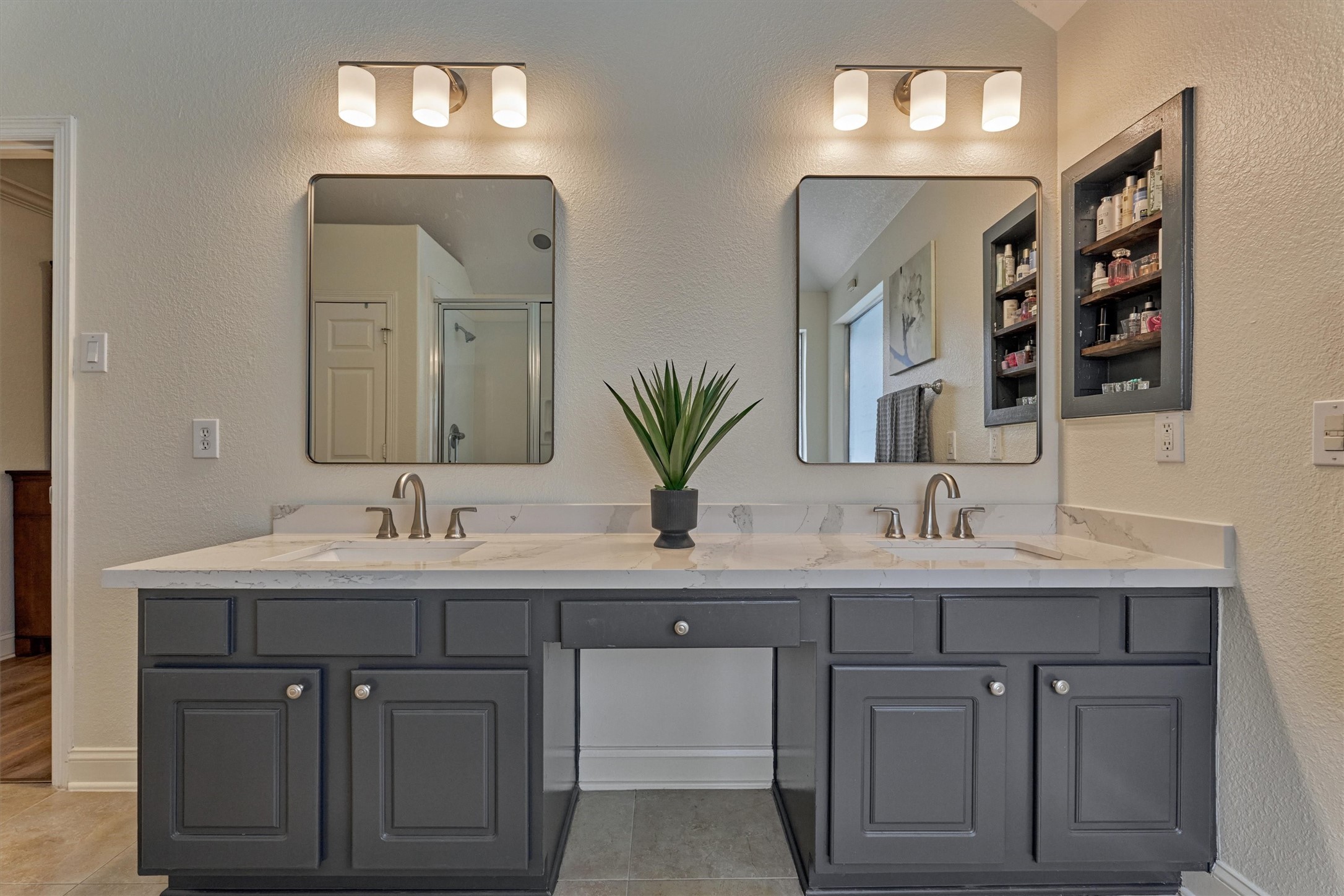 20938 Thistleberry Lane Spring, TX 77379 - Photo 26 of 45 Primary bath - double vanities with sit-in space. Beautiful counter tops, faucets, lighting and mirrors.