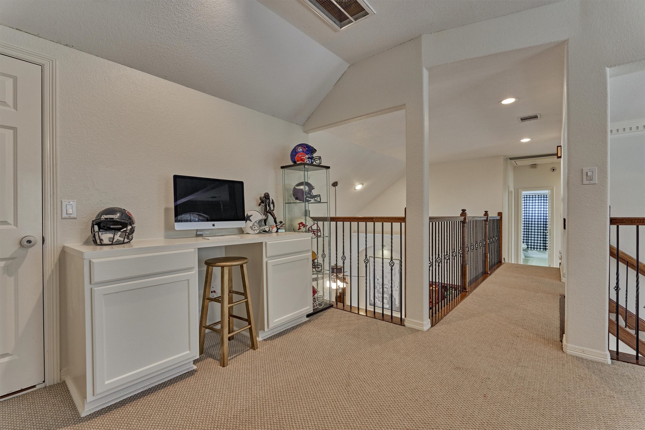 20938 Thistleberry Lane Spring, TX 77379 - Photo 30 of 45 Game Room with built-in desk/storage and door to large storage closet.
