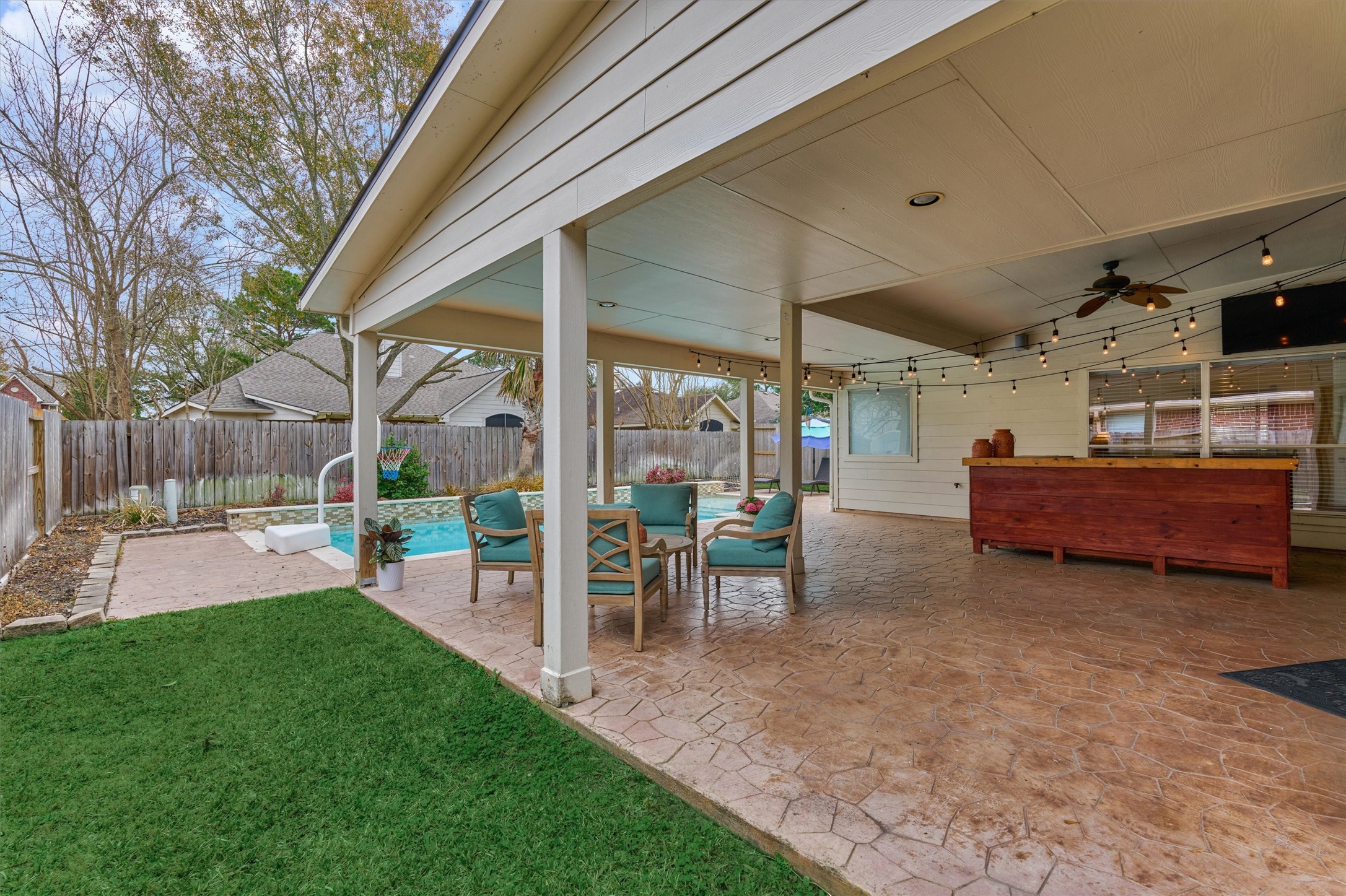 20938 Thistleberry Lane Spring, TX 77379 - Photo 39 of 45 Large covered patio allows for shade from the Texas sun. Plenty of space for lounging or dining.