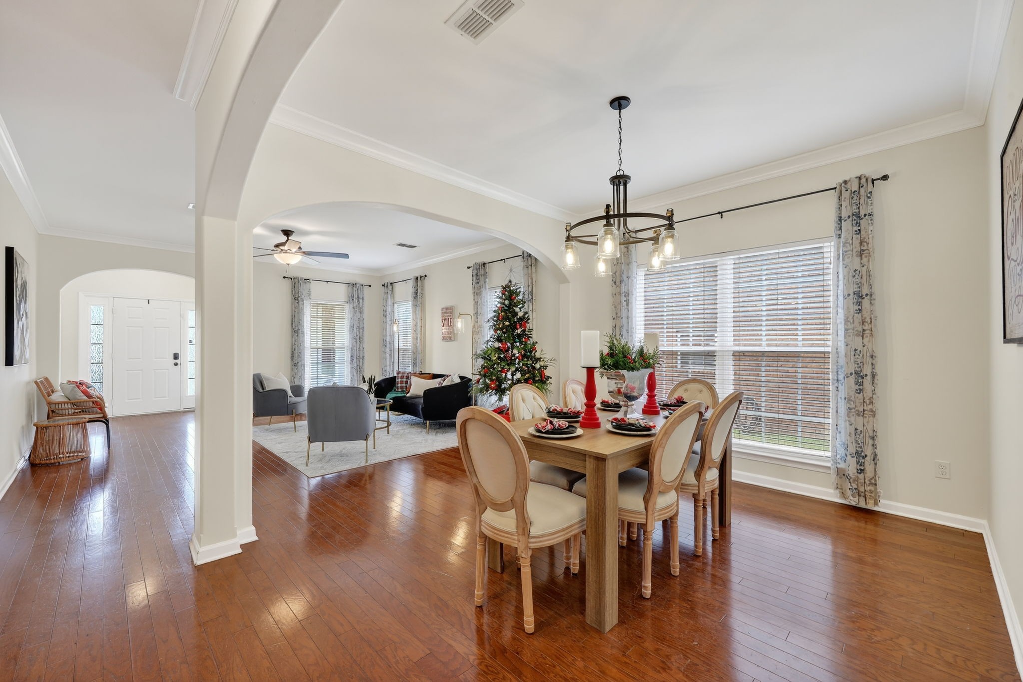 4093 Locerbie Circle Spring Hill, TN 37174 - Photo 13 of 51 a view of a dining room with furniture window and wooden floor