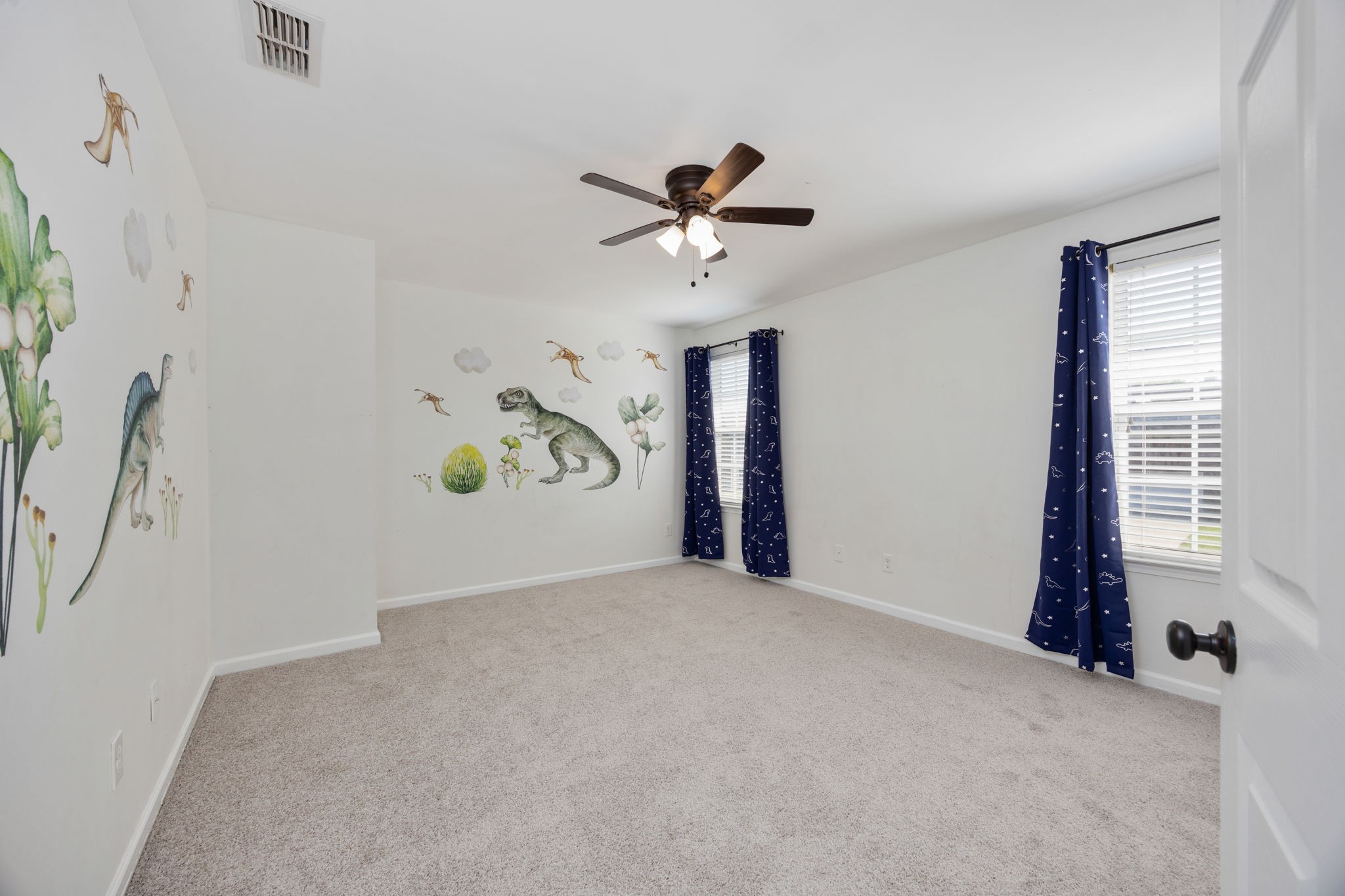 4093 Locerbie Circle Spring Hill, TN 37174 - Photo 20 of 51 a view of a livingroom with a window and a ceiling fan