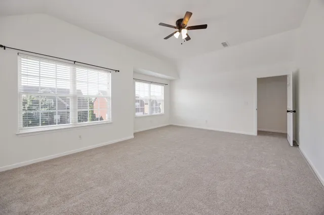 an aerial view of a house having yard
