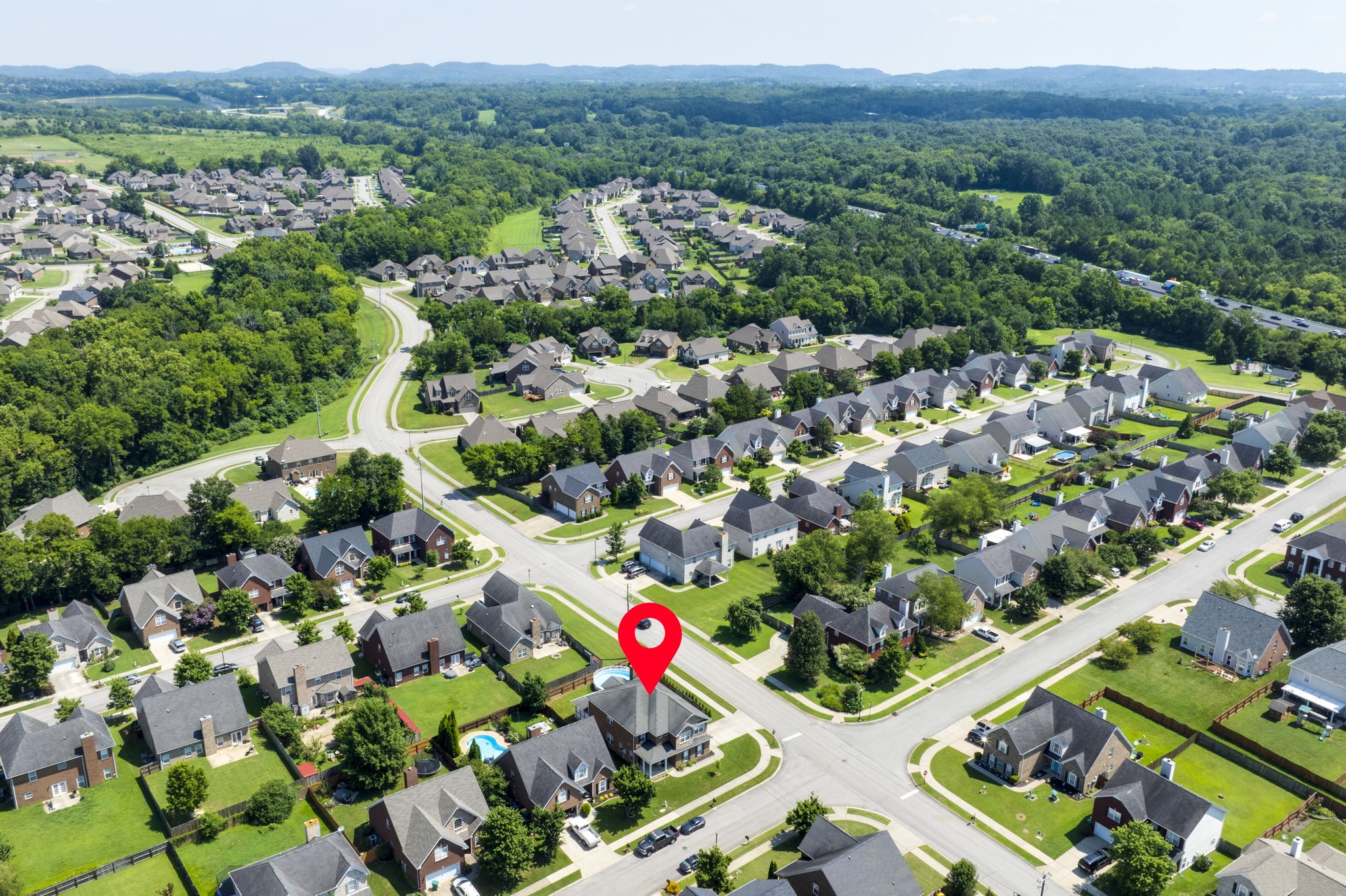 4093 Locerbie Circle Spring Hill, TN 37174 - Photo 49 of 51 an aerial view of residential houses with outdoor space and street view