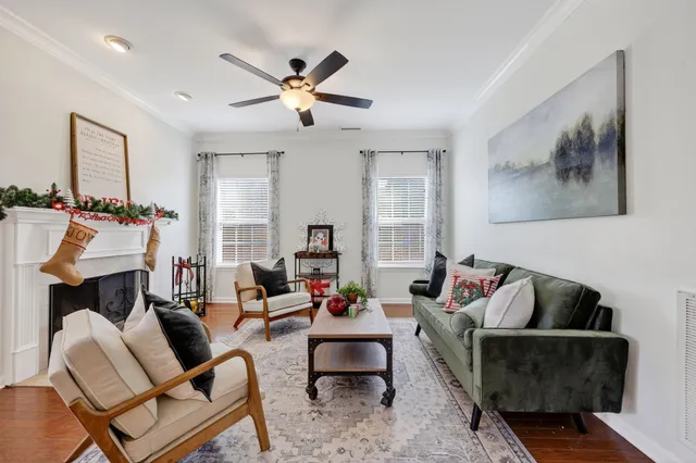 a kitchen with stainless steel appliances granite countertop a stove top oven a sink and dishwasher