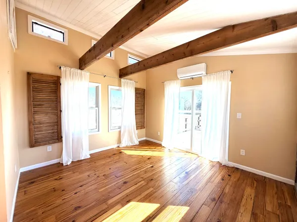 a view of an empty room and window