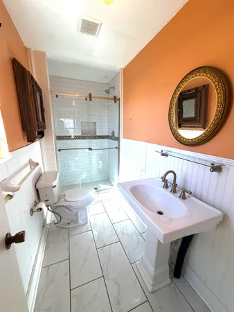 a kitchen with a sink cabinets and window