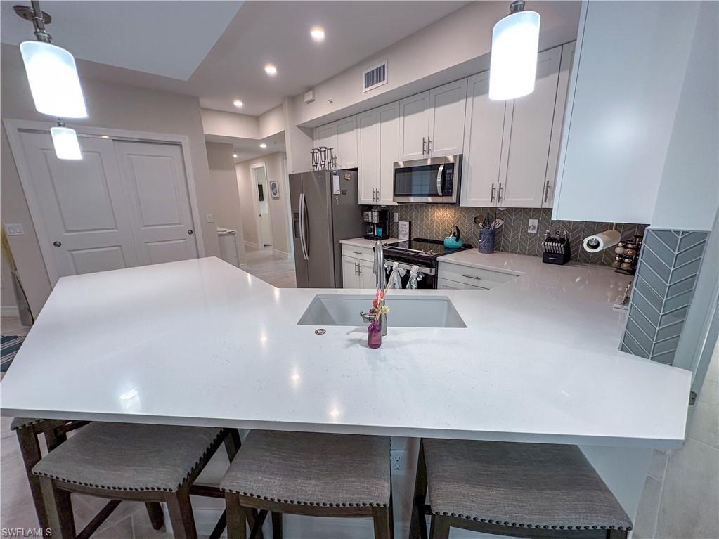 220 Indies Drive East, Unit 101 Naples, FL 34114 - Photo 17 of 45