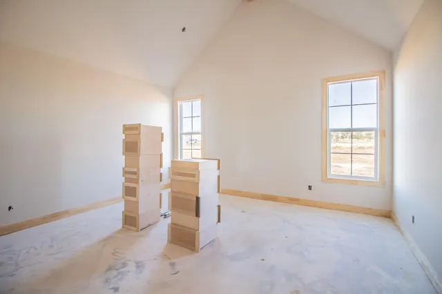 an empty room with windows