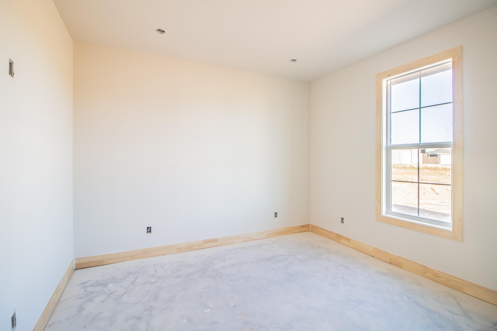 309 Juniper New Home, TX 79381 - Photo 16 of 24 an empty room with a window