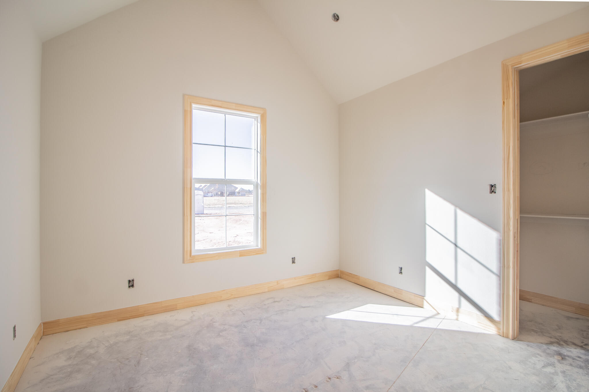 309 Juniper New Home, TX 79381 - Photo 19 of 24 an empty room with windows